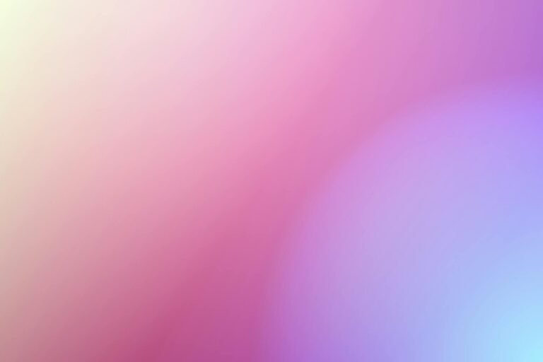 Colorful gradient background featuring pink and purple hues for creative design projects.
