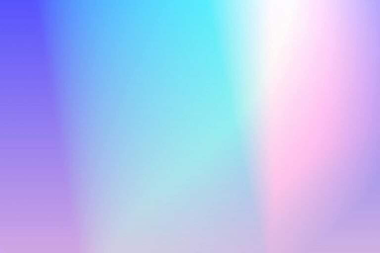 Vibrant multicolor gradient background with soft pink, purple, and blue hues.
